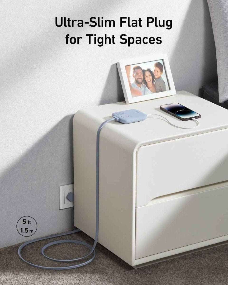 White compact charging station with slim wall plug and built-in power outlets