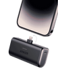 Pocket power bank with built-in Lightning connector and USB port, black finish.