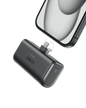 Compact power bank with built-in USB-C connector, in a dark shell