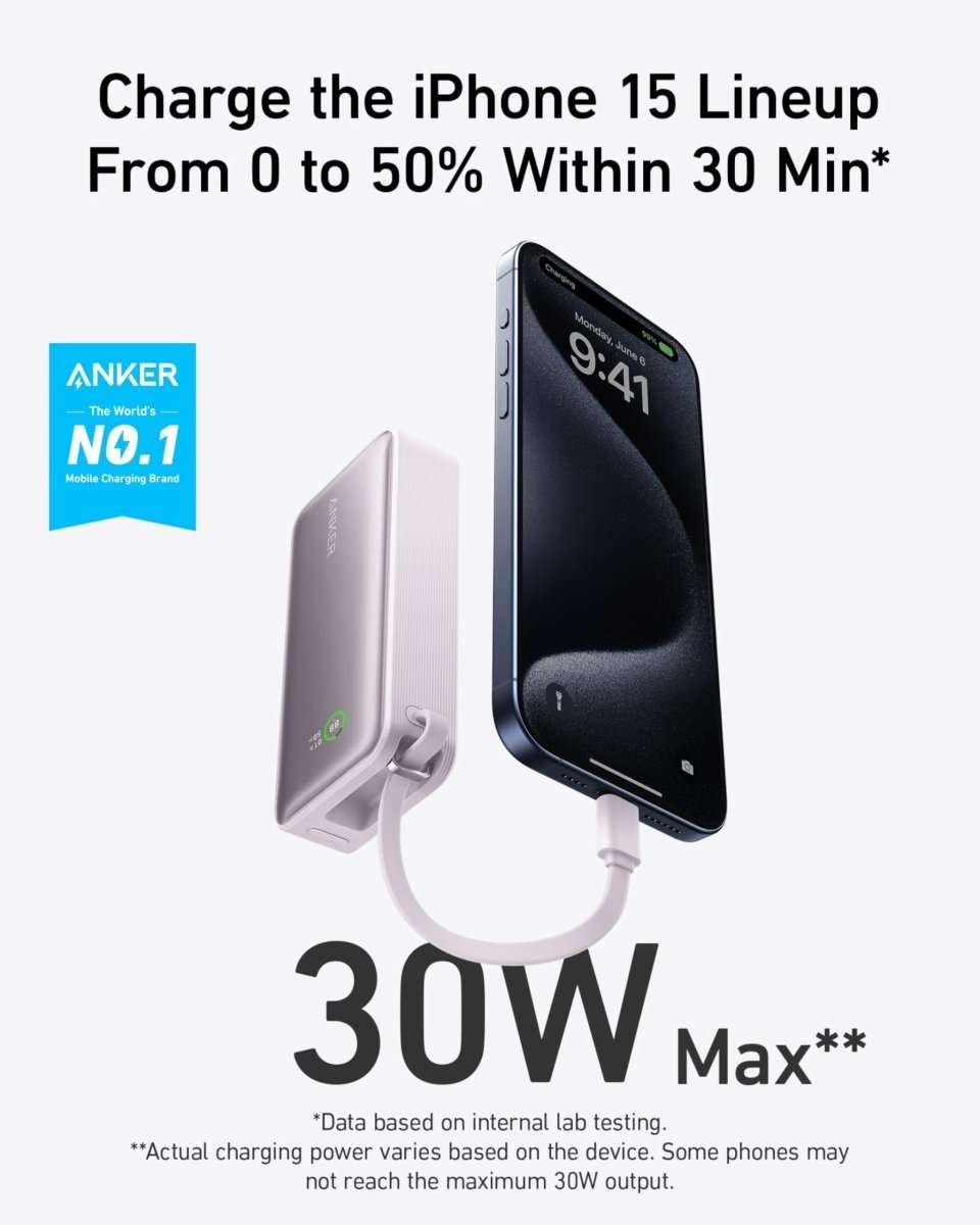 Pale silver portable power bank with USB-C cable connected to a smartphone, charging.