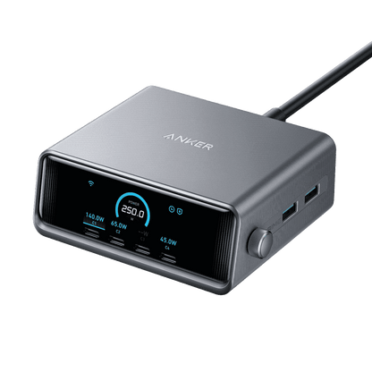 Anker GaN multi-port charger with LCD display, side USB ports, and power cable
