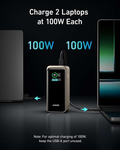 Champagne power bank with illuminated display and connected cables