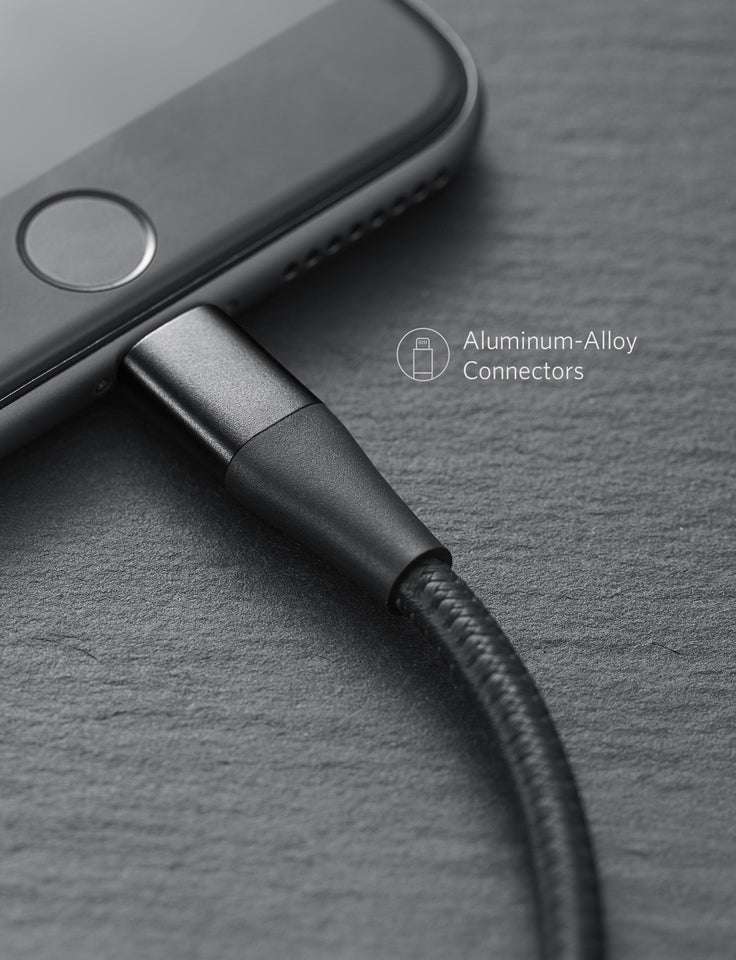 Metal connector end on black braided cable