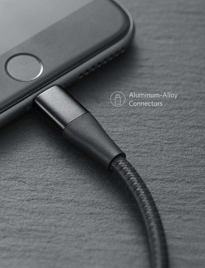 Metal connector end on black braided cable