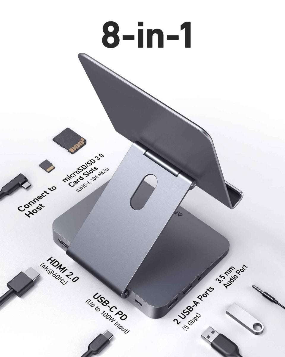 Gray Anker USB‑C hub with tablet stand showing multiple ports and adapters