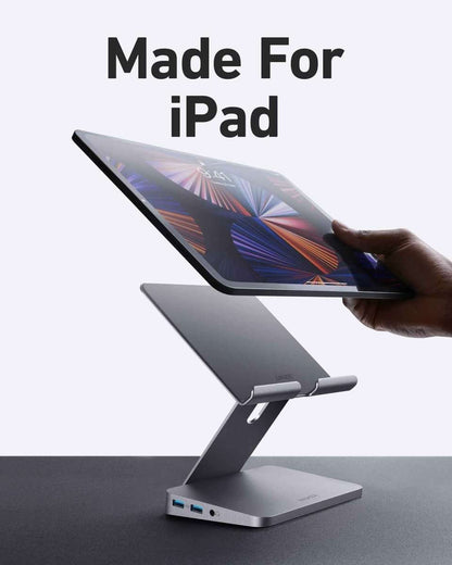 Anker USB‑C tablet stand hub in gray with tablet supported on raised dock