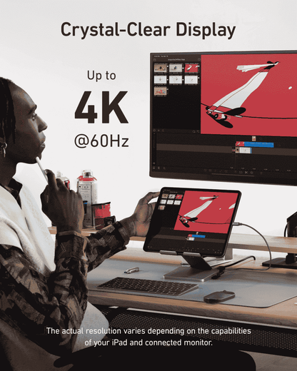 Gray Anker USB‑C tablet stand hub holding a tablet above the base