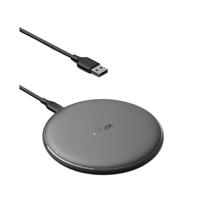 Anker wireless charging pad with USB cable, dark gray round base and indicator light