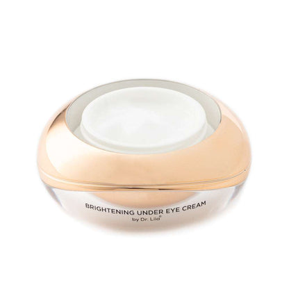 Beige under-eye cream jar with smooth white cream surface and gold trim