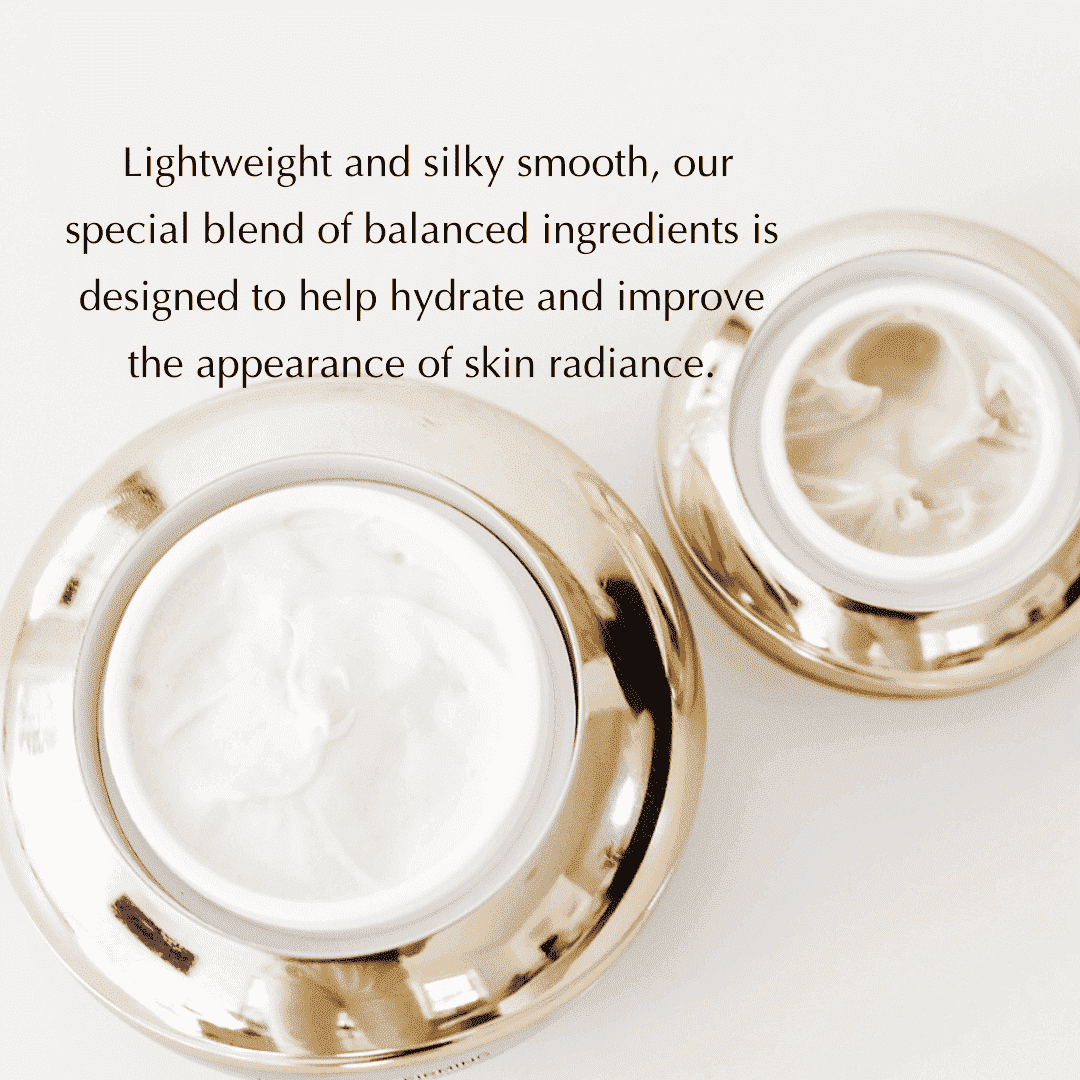 Gold-trim under-eye cream jars with swirled white cream and open lid