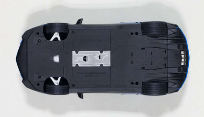 Blue 1:18 scale die-cast sports car, underside view with chassis details