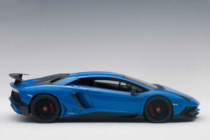 Blue 1:18 scale die-cast sports car, side profile with front angled