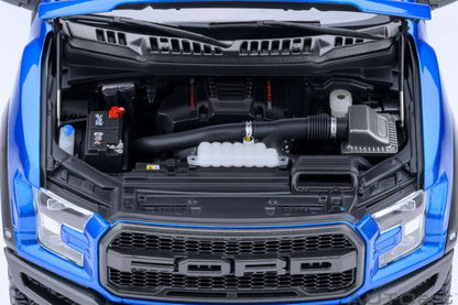 1:18 scale blue pickup truck front with open hood showing grille and engine