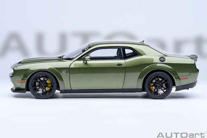 Green 1:18 scale Dodge Challenger model car side profile with black rims.