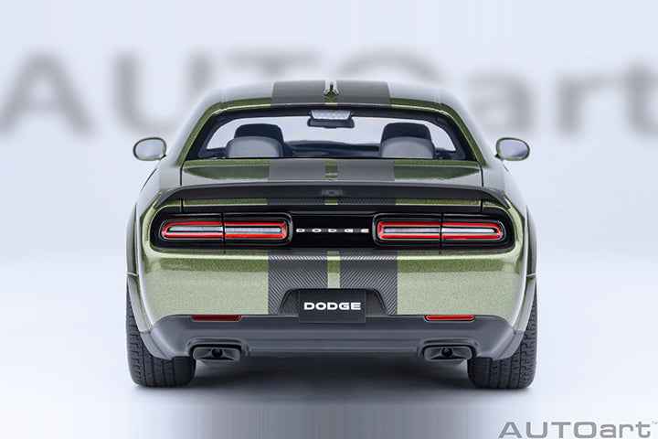 Rear view of a green 1:18 scale Dodge Challenger model car with red taillights.