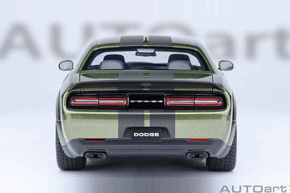 Rear view of a green 1:18 scale Dodge Challenger model car with red taillights.