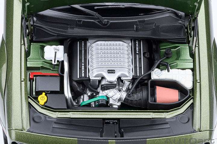 Green 1:18 die-cast sports car with hood open, detailed supercharged engine