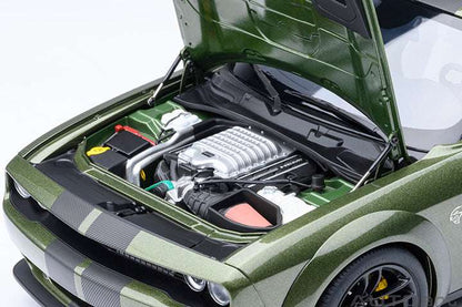Green 1:18 die-cast sports car with hood open, showing detailed engine bay
