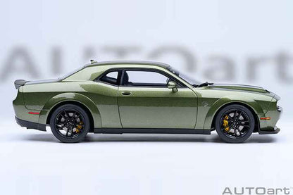Green 1:18 scale Dodge Challenger model car angled side view with hood vents.