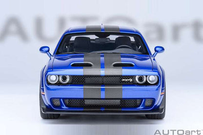 Front view die-cast sports car model in indigo blue with twin headlights and black grille