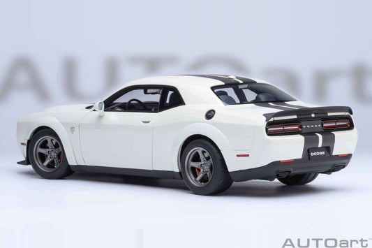 White 1:18 scale sports car model, rear three-quarter view with black stripe accents.