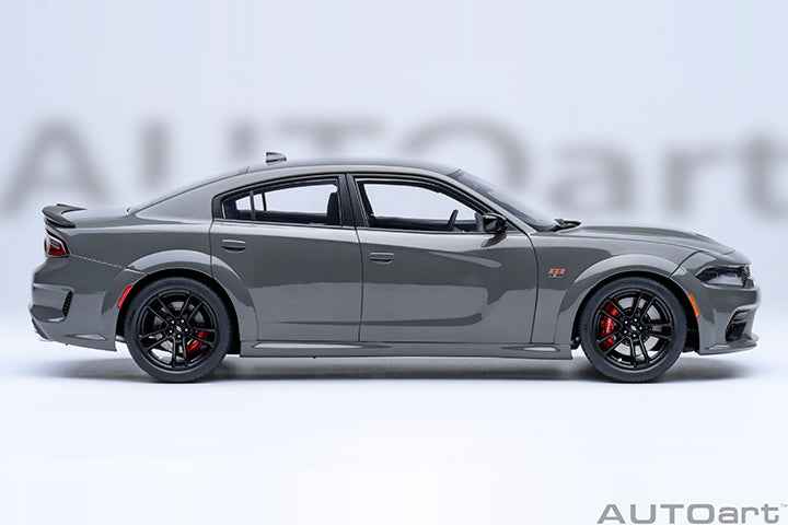 Grey Dodge Charger widebody die-cast model car, side view, black wheels and red accents.