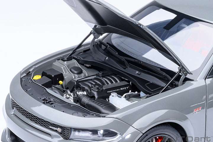 Gray die-cast Dodge Charger model with hood open, showing detailed engine bay.