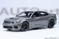 Grey Dodge Charger widebody die-cast model car, front three-quarter view, black wheels.