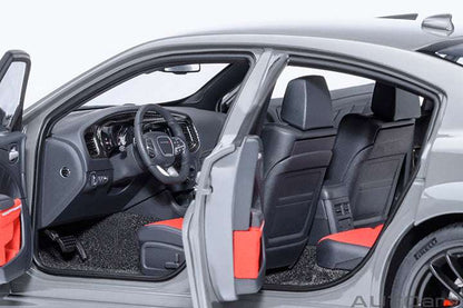 Dodge Charger widebody die-cast model car interior, black seats with red inserts.