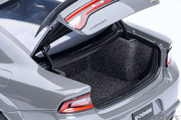 Gray die-cast Charger model with rear hatch open, showing dark cargo area.