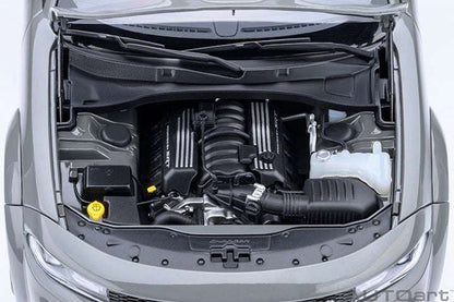 Gray die-cast Charger model with hood open, view of engine components.