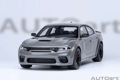 Gray die-cast Charger model front view with aggressive grille, splitter, and dark headlights.