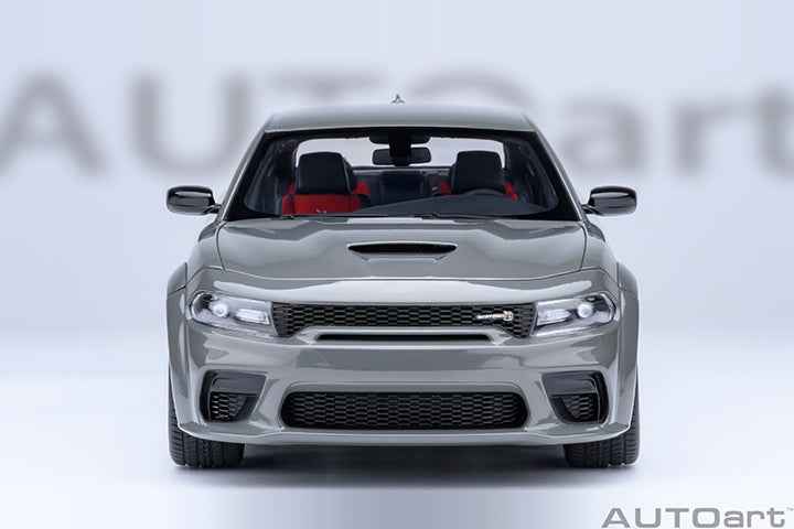 Grey Dodge Charger widebody die-cast model car, front view, mesh grille and headlights.
