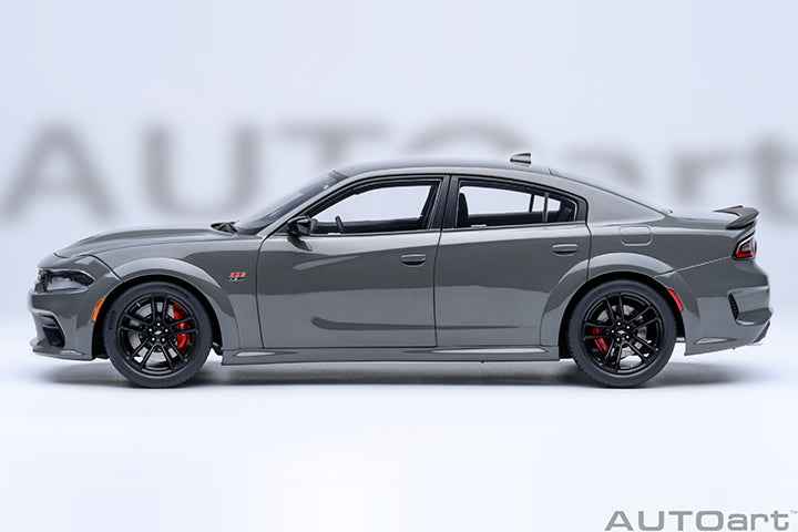 Grey Dodge Charger widebody die-cast model car, side profile, black wheels and stripes.