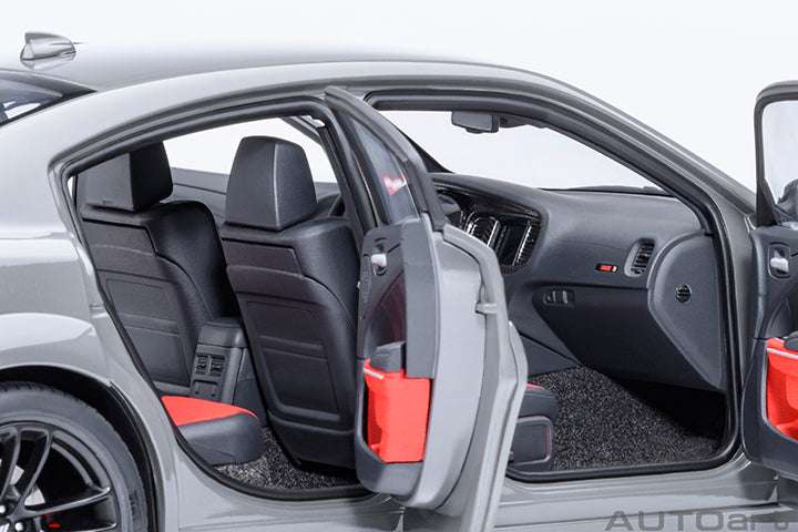 Dodge Charger widebody die-cast model car cabin, open door, black dash and seats.