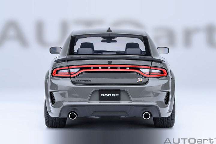 Grey Dodge Charger widebody die-cast model car, rear view, Dodge badge and red taillights.