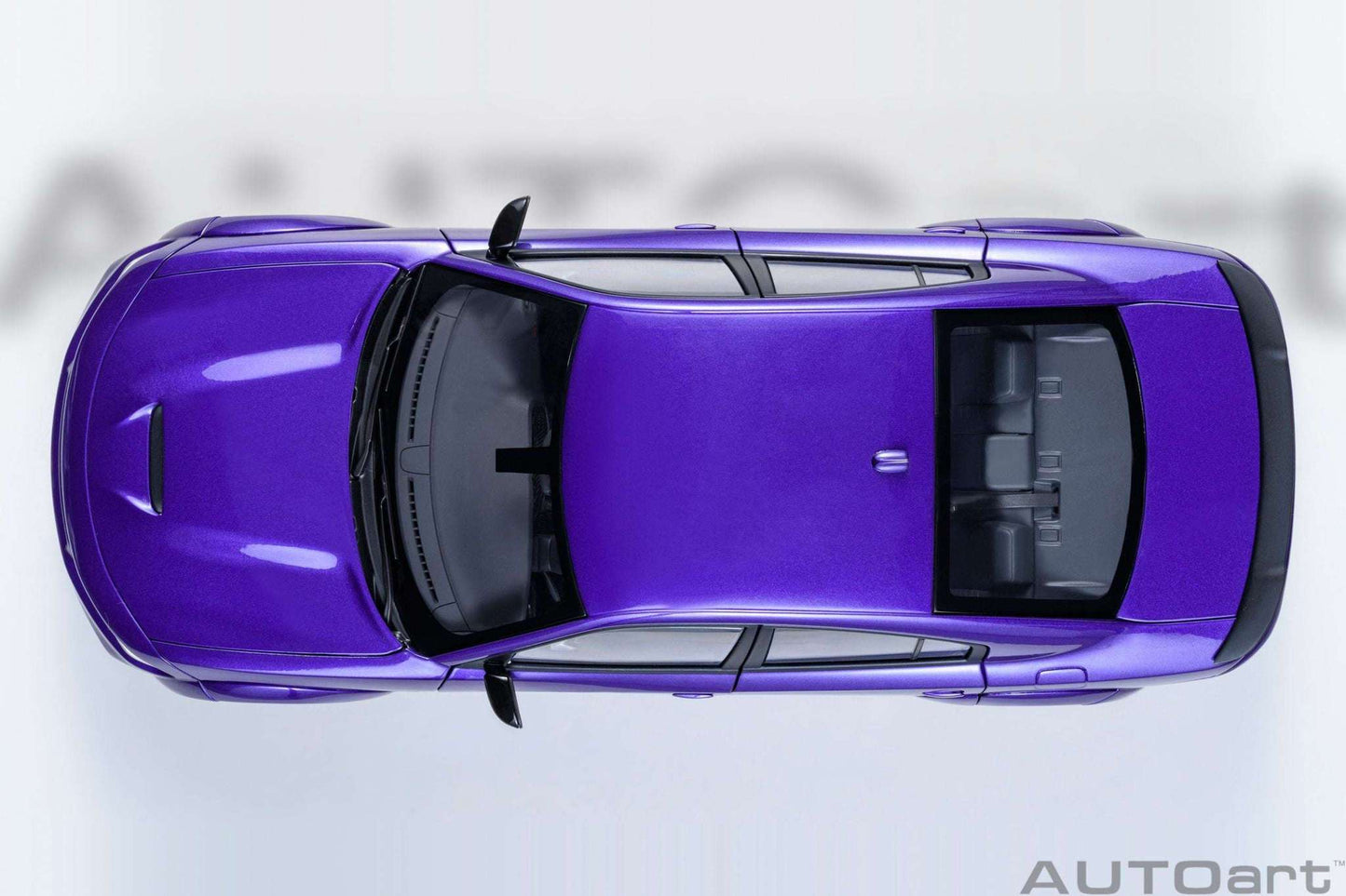 AUTOart 1:18 scale purple Dodge Charger model, roof and rear spoiler top view