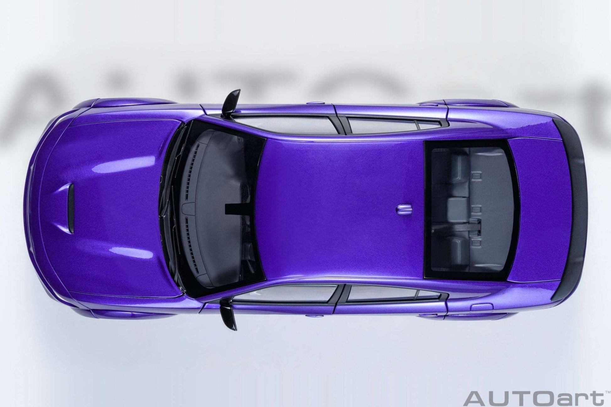 AUTOart 1:18 scale purple Dodge Charger model, roof and rear spoiler top view