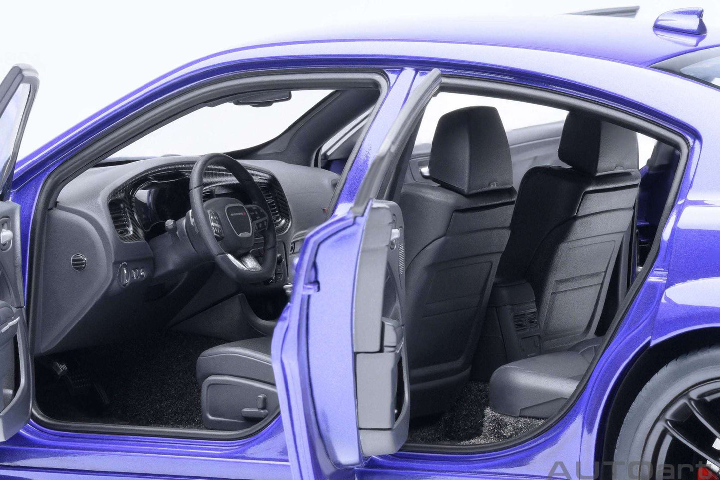 AUTOart 1:18 scale Dodge Charger model, interior view with steering wheel and front seats