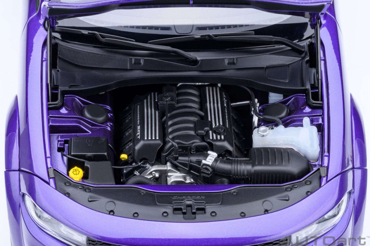 Purple die-cast muscle car engine bay with hood open, black intake and wiring details
