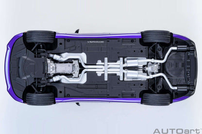 AUTOart 1:18 scale purple Dodge Charger model, underside view with exposed drivetrain