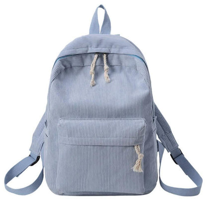 Light blue backpack with tassel drawstring, front zip pocket, and adjustable shoulder straps