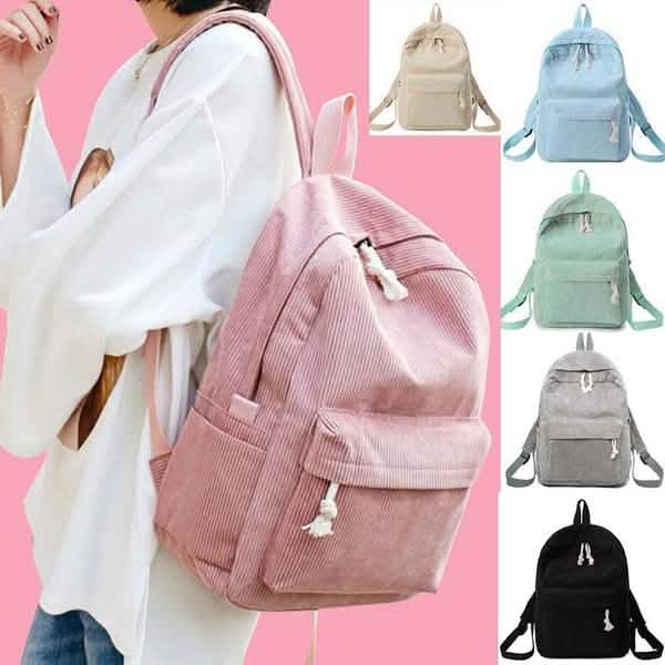Corduroy mini backpacks in multiple colors, including pink and light blue