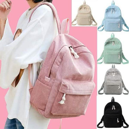 Corduroy mini backpacks in multiple colors, including pink and light blue