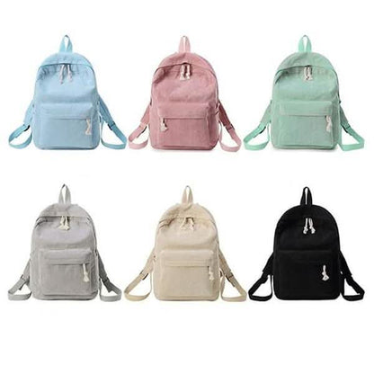 Assorted mini backpacks in blue, pink, green, gray, beige, and black