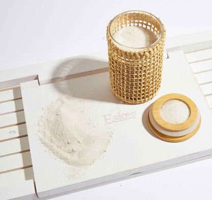 Whitewashed wooden bath board with slatted surface and round side handle