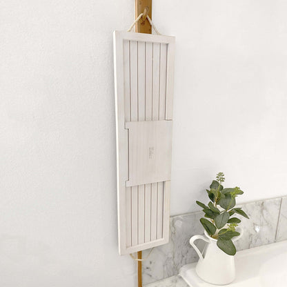 White wooden hanging bath board with hinged slats and back storage panel