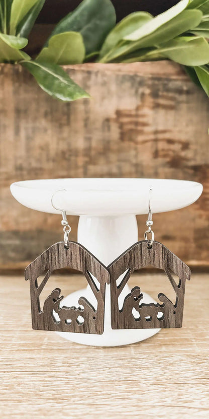 Nativity scene dangle earrings in dark wood, two stable cutout drops