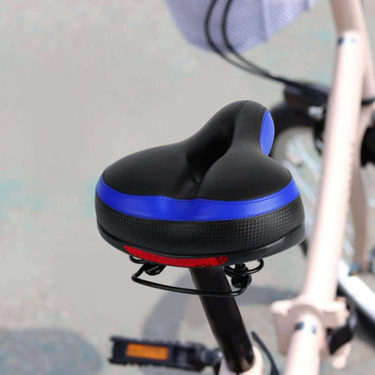 Black padded bike saddle with blue side panel detail on a bicycle