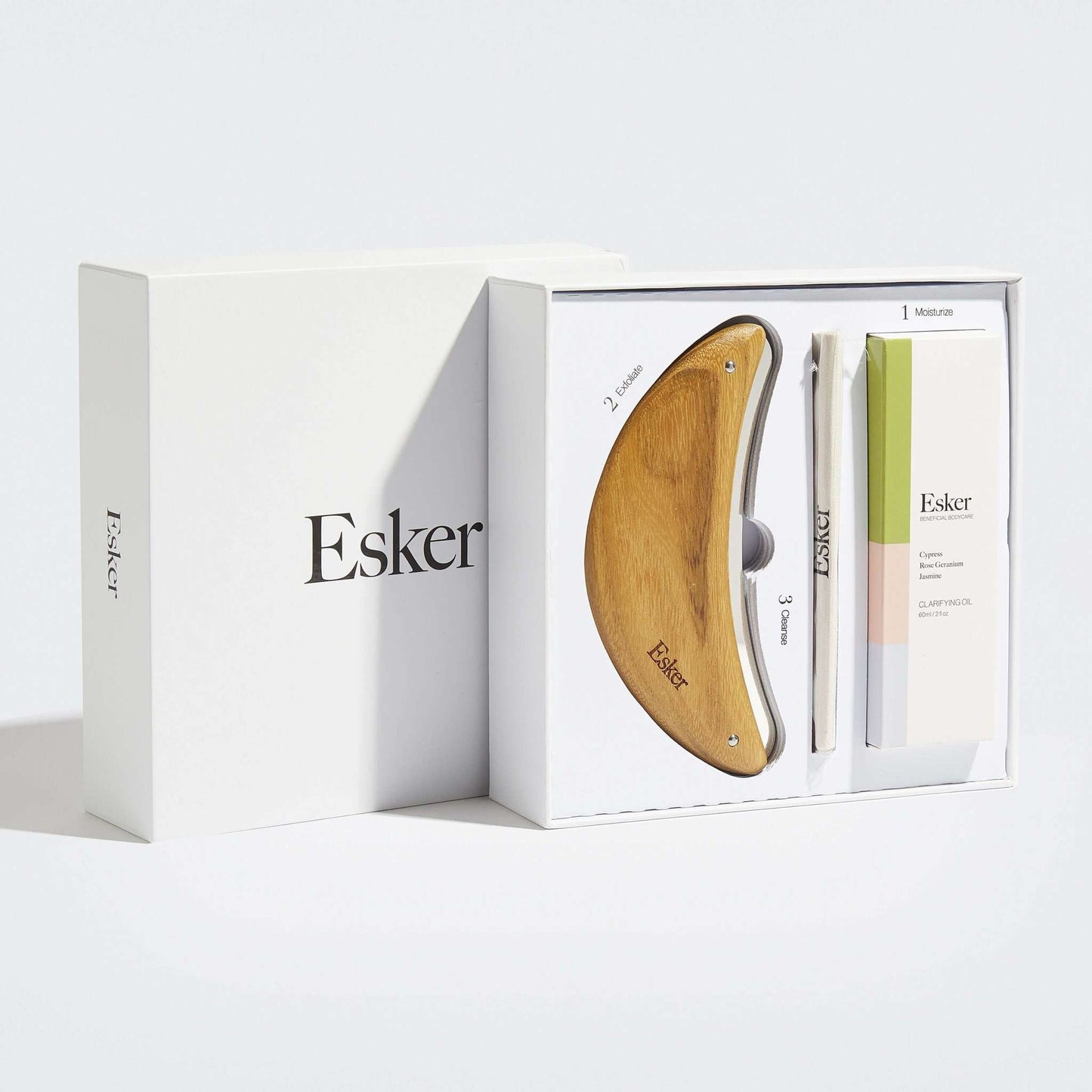 Body exfoliation tool set with wooden blade and slim oil sachet pack in box